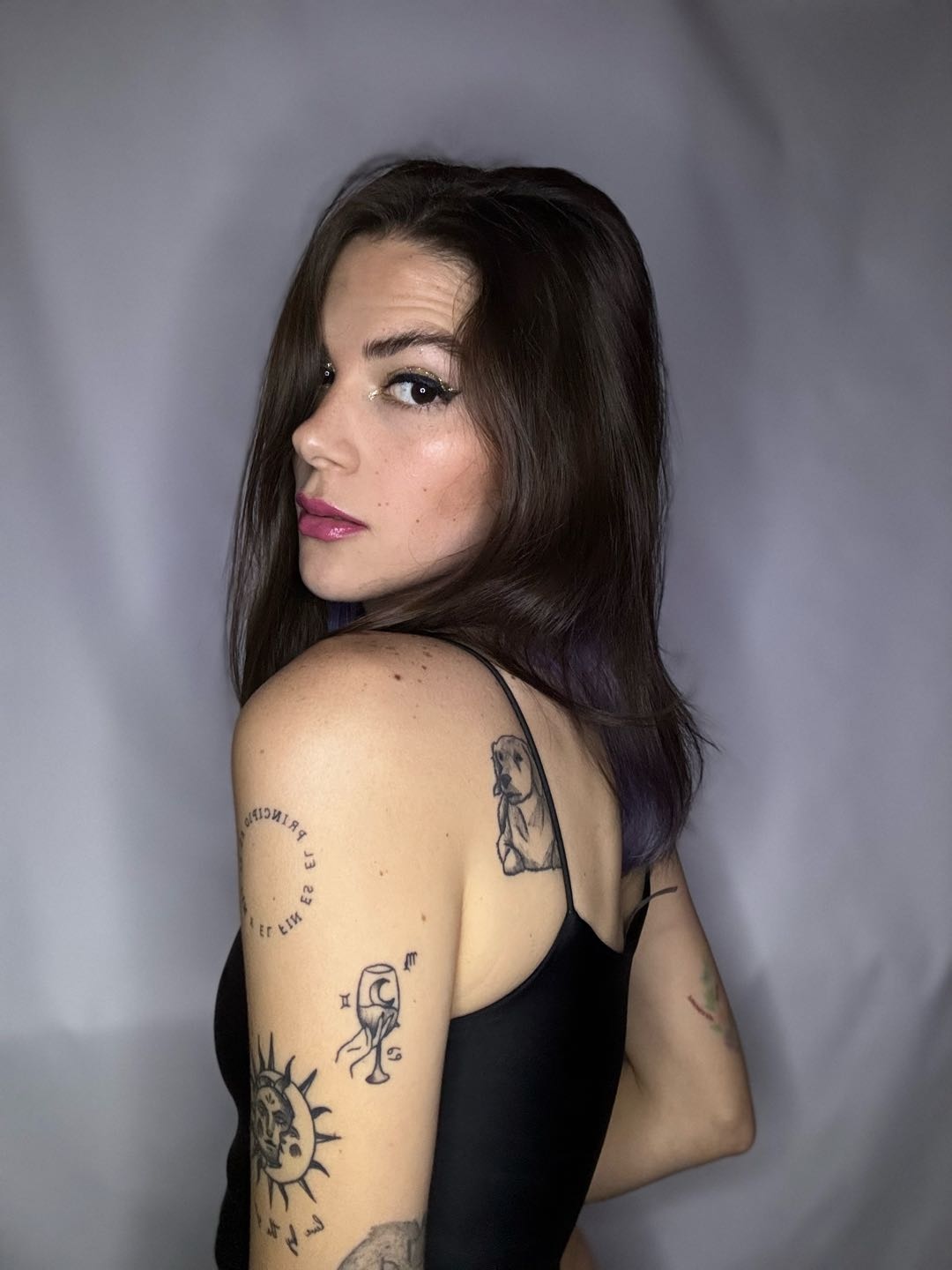 A woman looking back toward the camera